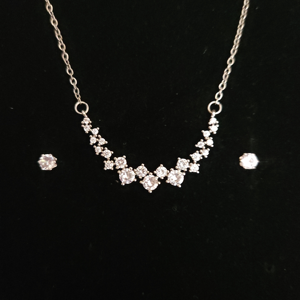 Silver And Sparkling Gemstone Necklace and Earring Set